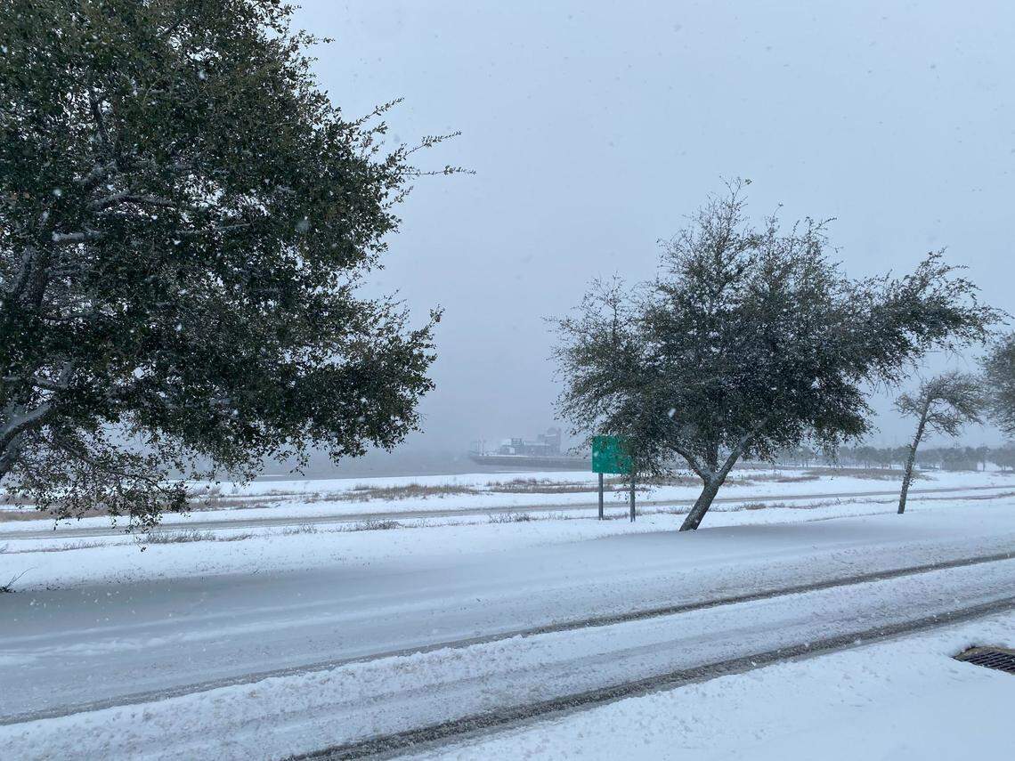 U.S. 90, looking toward Pass Christian Harbor, shows the effects of a day’s worth of snow Tuesday, Jan. 21, 2025.