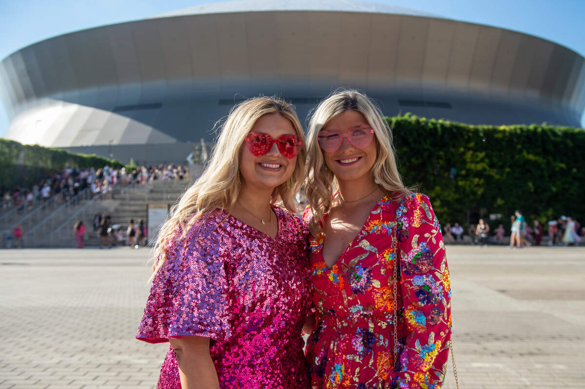 Fans show off their outfits outside the Cesars Superdome in New Orleans on Friday, Oct. 25, 2024, before Taylor Swift’s Eras Tour performance that night.