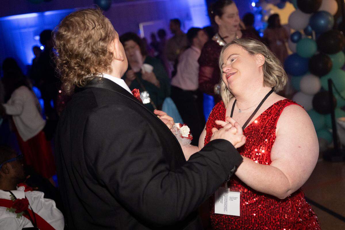 Guests of honor dance as music is played on the dance floor during Night to Shine at Woolmarket Baptist Church on Friday, Feb. 13, 2026.