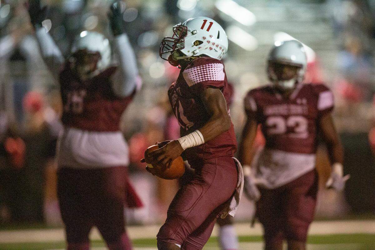 Lawrence County’s Kannon Cato scores a touchdown against Poplarville at Poplarville High School in Poplarville on Friday, Oct. 7, 2022.