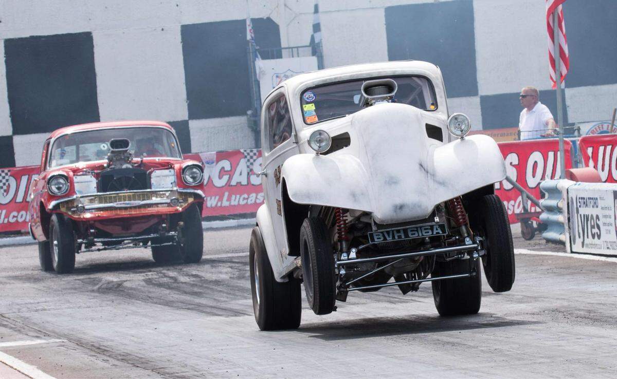 Martin Bishop’s 1952 Ford Anglia in a drag race in the United Kingdom before it was painted red.
