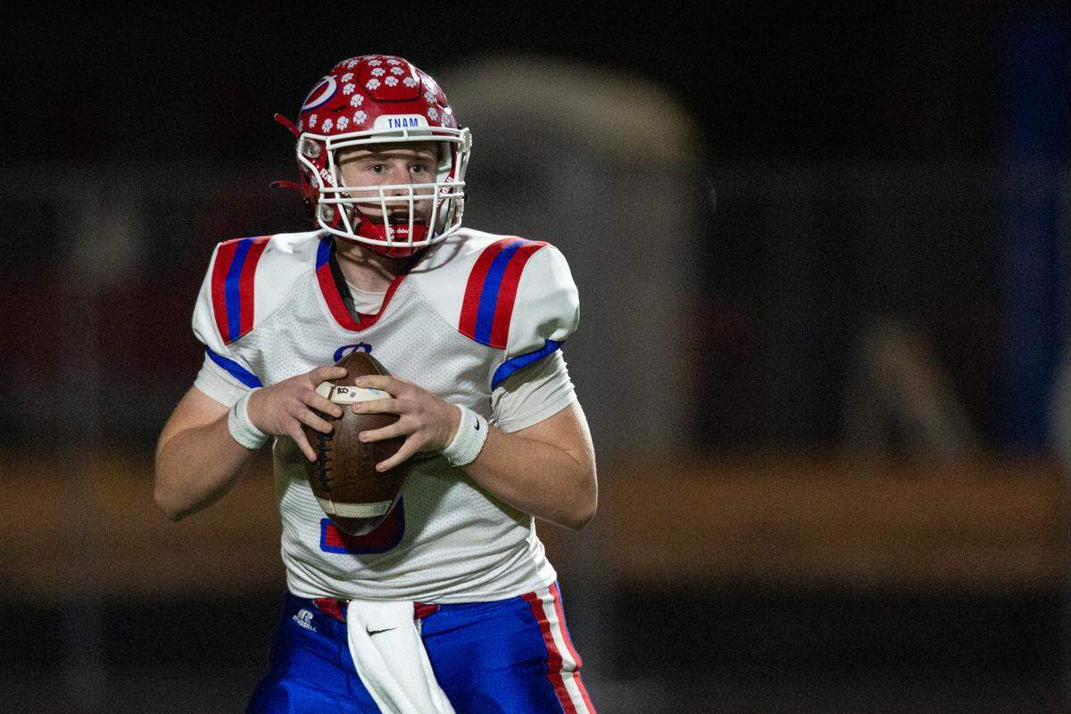 Pascagoula quarterback Silas Corder looks to throw a pass during a playoff game at Lee-Triplett Stadium in Picayune on Friday, Nov. 17, 2023.