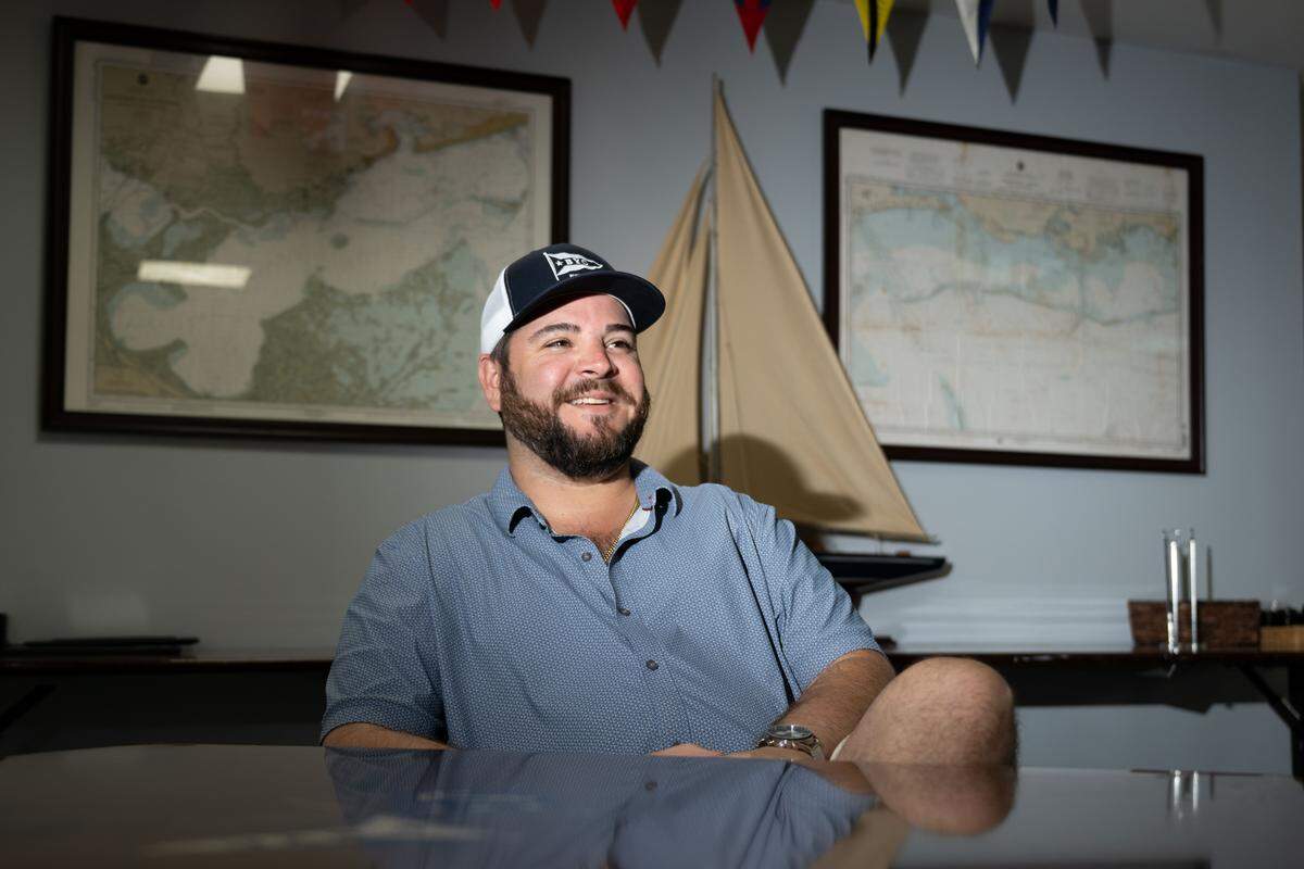 Commodore Stephen Roybal poses for a portrait at the Biloxi Yacht Club in downtown Biloxi.