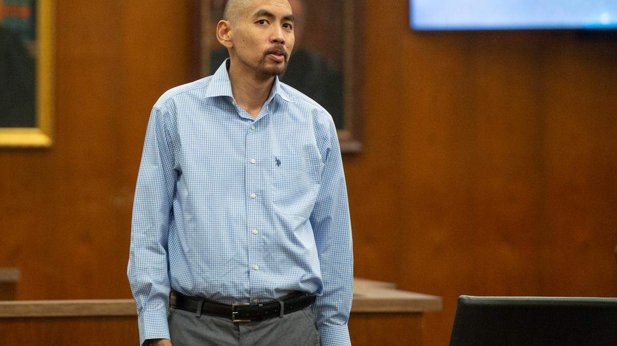 Pitipong Daengbunga stands as court goes into recess for the day on Tuesday during Daengbunga’s trial for the murder of Jamie Boggs at Harrison County Circuit Court in Biloxi.