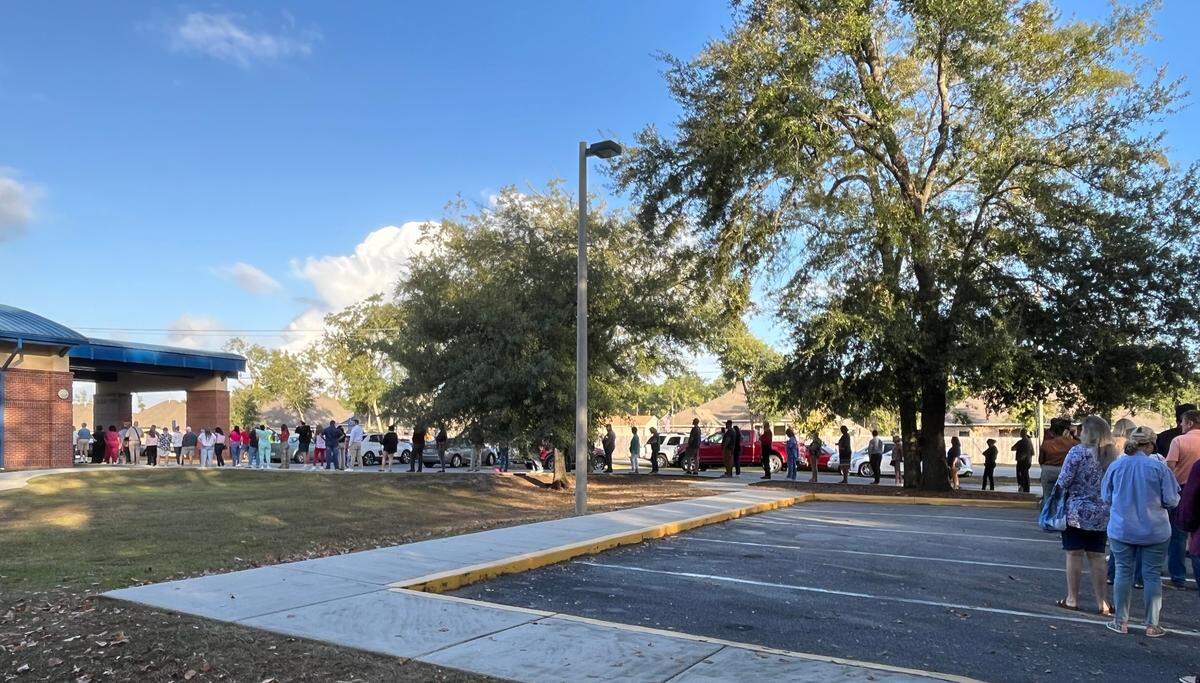 The early morning line to vote at the West Jackson County Safe Room stretched around the building Tuesday, Nov. 5, 2024.