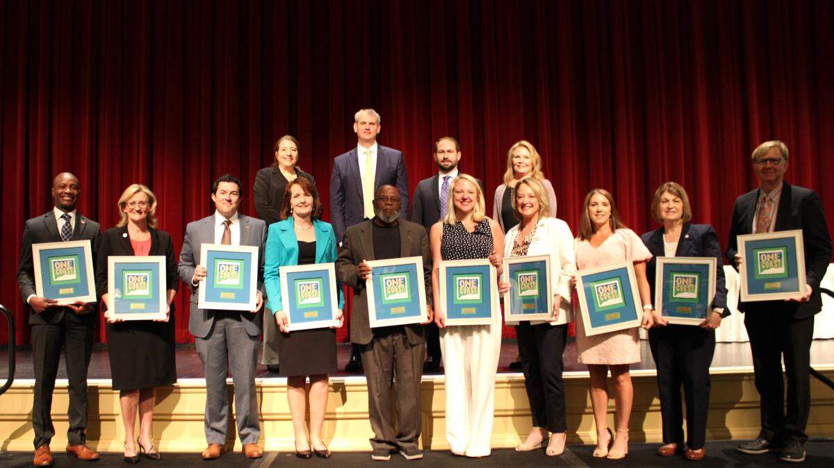 One Coast Community Leaders were presented their awards Tuesday by the Mississippi Coast Chamber during a ceremony at Beau Rivage Resort & Casino in Biloxi. Front Row: Dr. Cedric Bradley, Angel Greer, Jonathan Jones, Joy Saucier, Aaron Standberry (CeCe Shabazz father), Tiffany Murdock, Kay Kell, Nikki Johns, Dr. Cassandra Conner, John Anderson. Second Row: Amber Olsen, Regan Kane, Casey Hill, Sandra Carter.