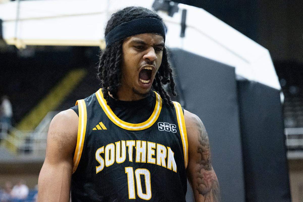Southern Mississippi guard Isaac Taveras (10) reacts after scoring.