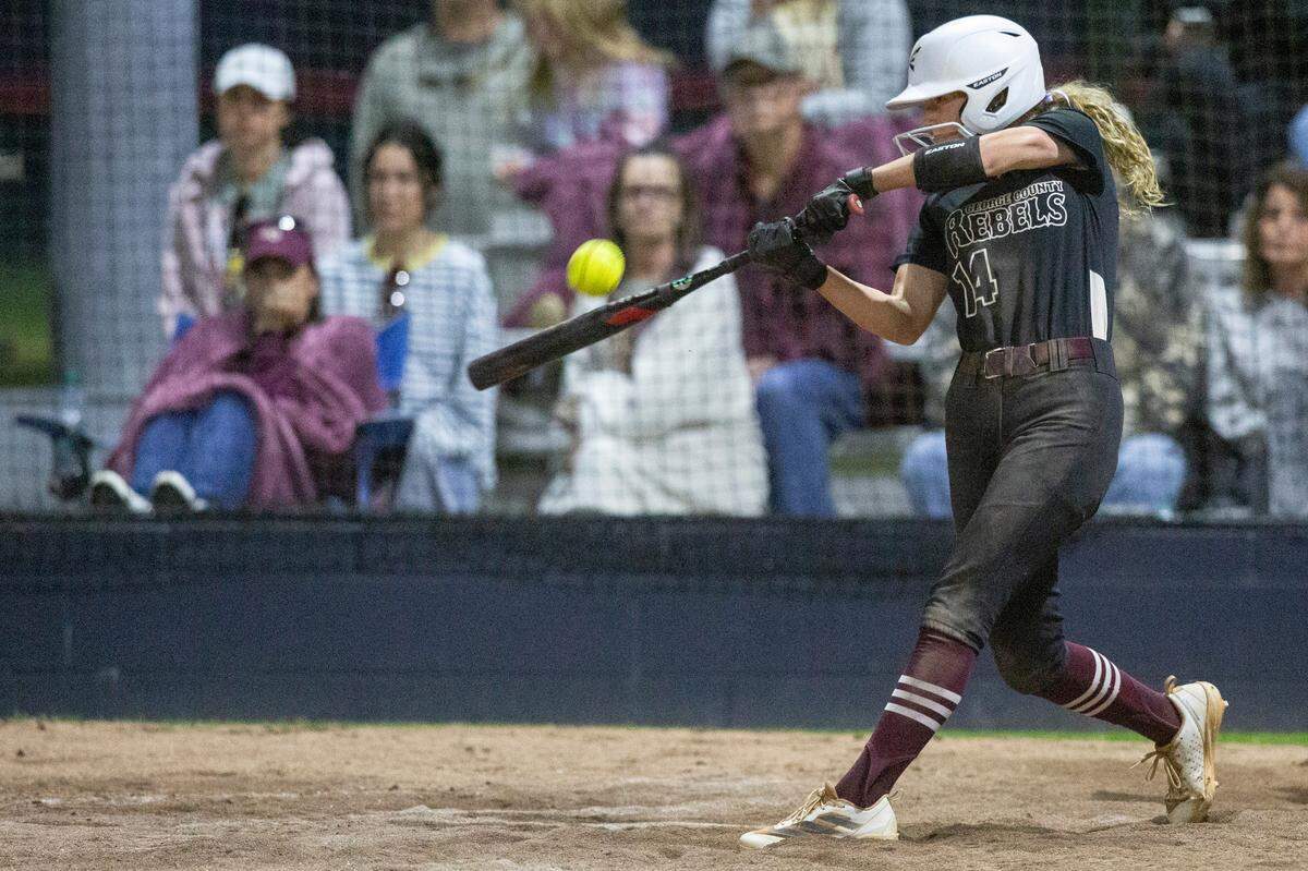 George County’s Paisley Pipkins hits the ball during a softball game between George County and Hancock at Hancock High in Kiln on Tuesday, March 18, 2025.