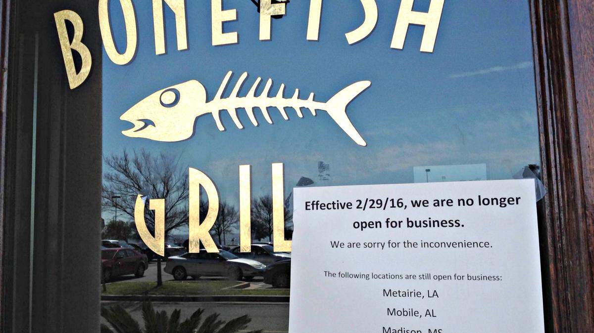 MARY PEREZ/SUN HERALD 
 A sign on the front door of Bonefish Grill at the Edgewater Mall in Biloxi says the restaurant has closed effective immediately.