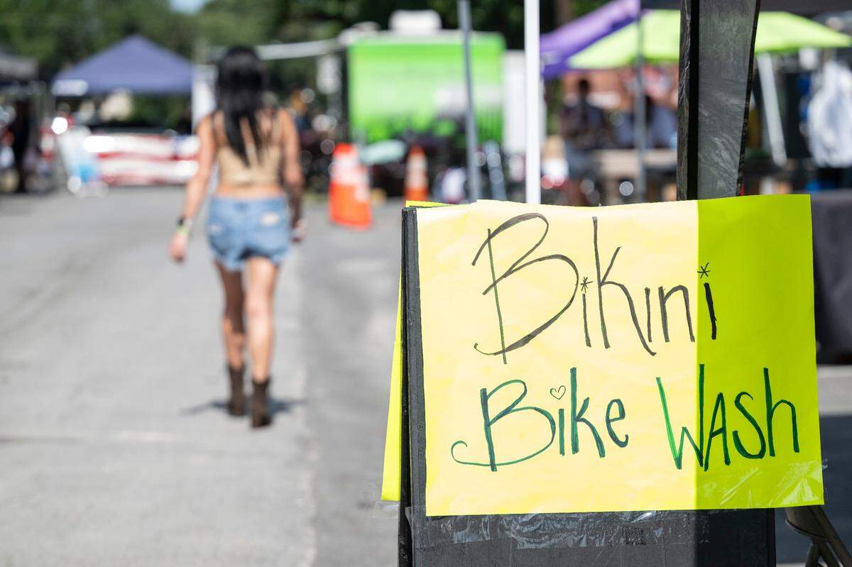A sign advertising a Bikini Bike Wash at Bikin’ The Beach in Biloxi on Friday, June 6, 2025.