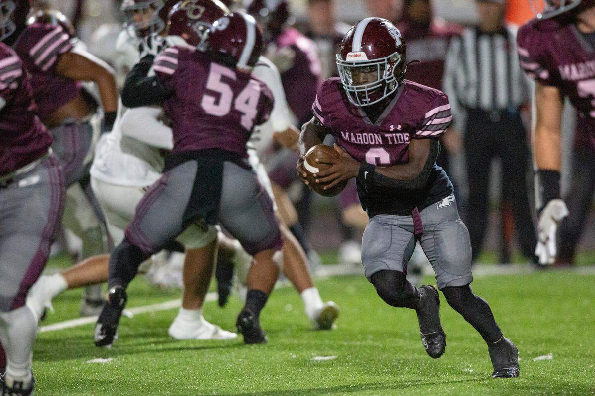Picayune’s Brandon Parker Jr. runs the ball during a playoff game between Picayune and George County at Lee-Triplett Stadium in Picayune on Friday, Nov. 22, 2024.