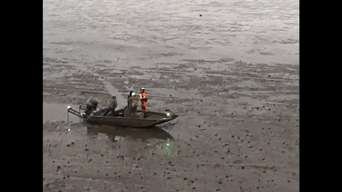 The U.S. Coast Guard rescued three anglers in a Louisiana bayou after the water suddenly receded in advance of a storm front.