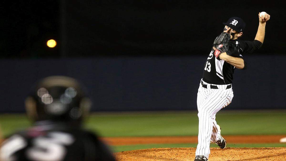 AMANDA McCOY/SUN HERALD 
 D'Iberville's Andrew Bird pitches against Biloxi on March 4, 2016, at MGM Park in Biloxi. The Warriors went 3-0 last week with wins over Gulfport, Harrison Central and Vancleave.