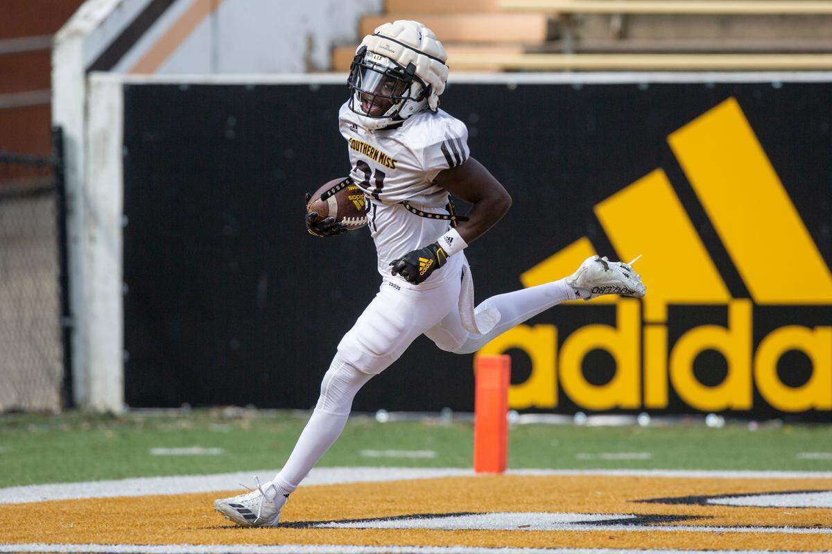 Southern Miss wide receiver Tiaquelin Mims runs the ball in for a touchdown during a scrimmage at M.M. Roberts Stadium in Hattiesburg on Saturday, March 25, 2023.