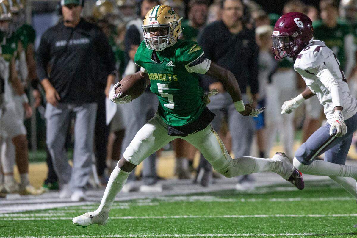 Poplarville’s Ty Keys runs the ball up the field during a playoff game against Forrest County Agricultural High School at Poplarville High School in Poplarville on Friday, Nov. 10, 2023.