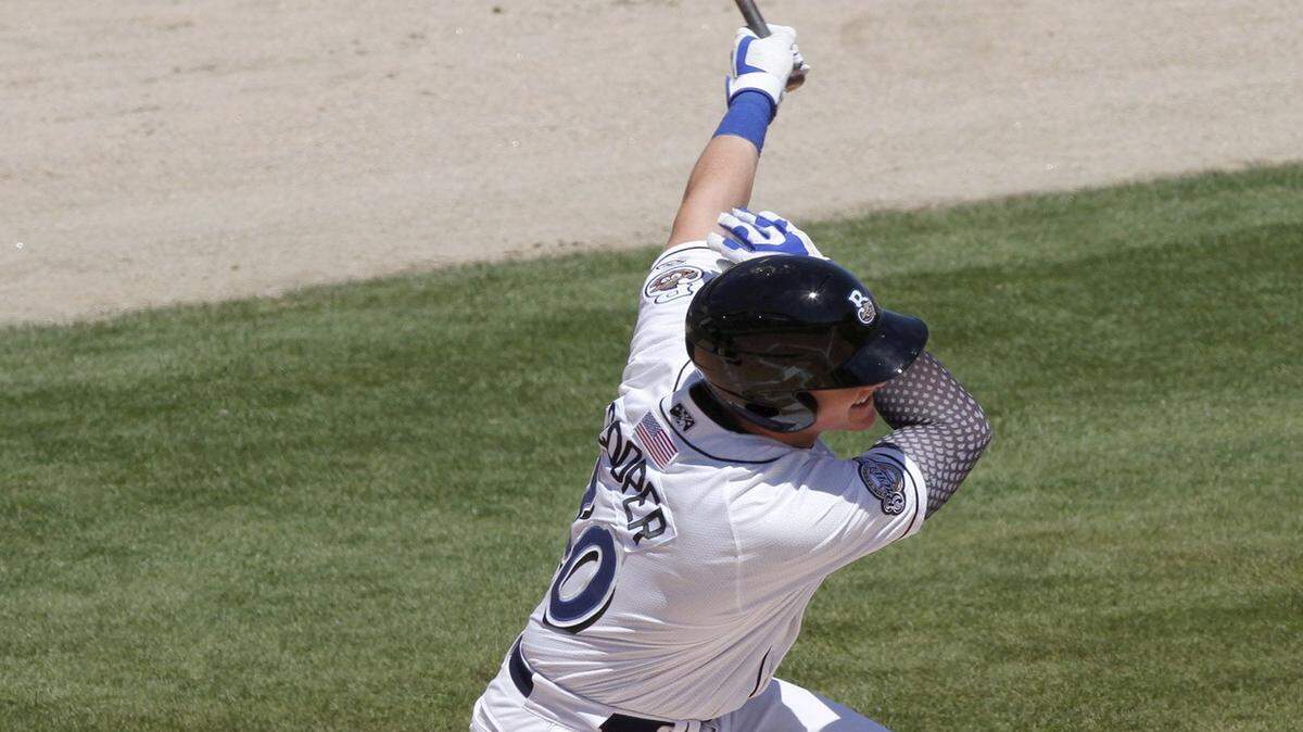 TIM ISBELL/SUN HERALD 
 Garrett Cooper of the Biloxi Shuckers takes a swing at the ball at MGM Park, Saturday, Apr. 2, 2016.