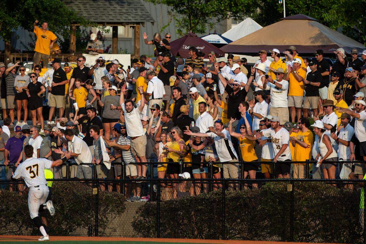 Southern Miss fans cheer after defeating LSU 8-7 in the NCAA Regionals at Pete Taylor Park in Hattiesburg on Monday, June 6, 2022. Southern Miss will advance to super regionals.