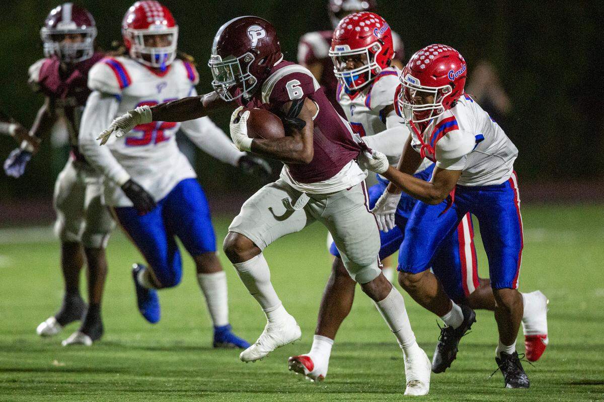Picayune’s Chris Davis runs the ball during a playoff game at Lee-Triplett Stadium in Picayune on Friday, Nov. 17, 2023.