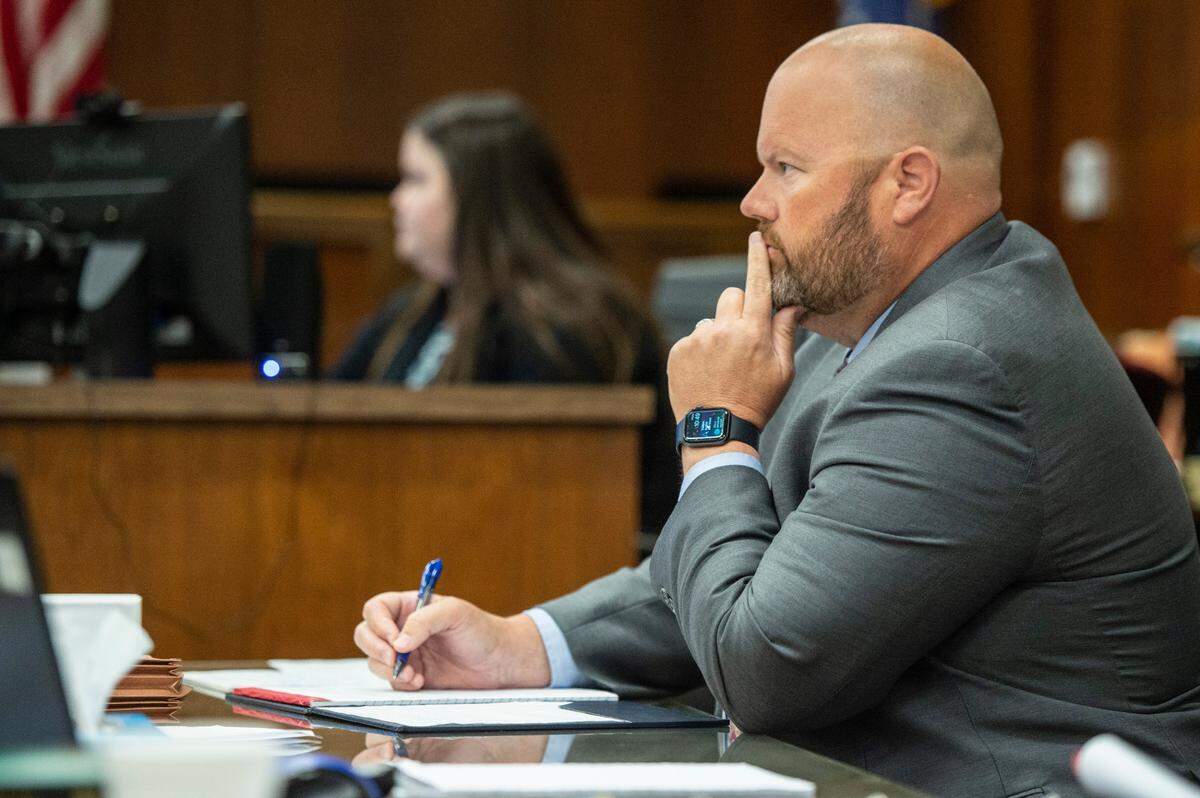 District attorney George Huffman listens as the defense makes opening statements in the trial of Cliff Kirkland in Harrison County Circuit Court in Biloxi on Thursday, May 12, 2022.