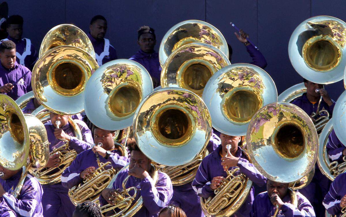 TIM ISBELL/SUN HERALDThe Alcorn State tuba section plays loud as they enter MGM Park during MLK Day parade and Battle of the Bands, Monday, Jan. 18, 2016.