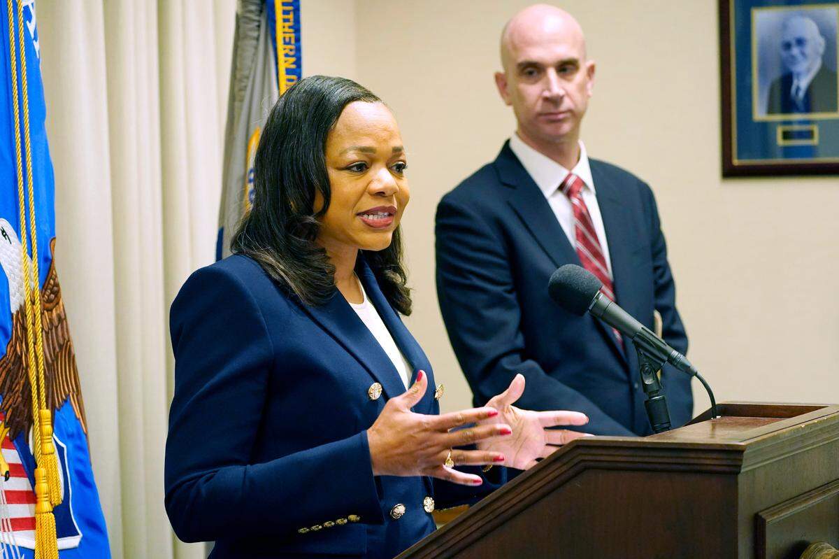 Assistant Attorney General Kristen Clarke of the U.S. Justice Department’s Civil Rights Division speaks at a news conference last month in Jackson, as Todd W. Gee, U.S. attorney for the Southern District of Mississippi listens. Clarke and Gee filed court papers earlier this month, saying that a law creating a state-run court in part of Mississippi’s capital city is a continuation of the state’s history of trying to suppress Black people’s participation in government.