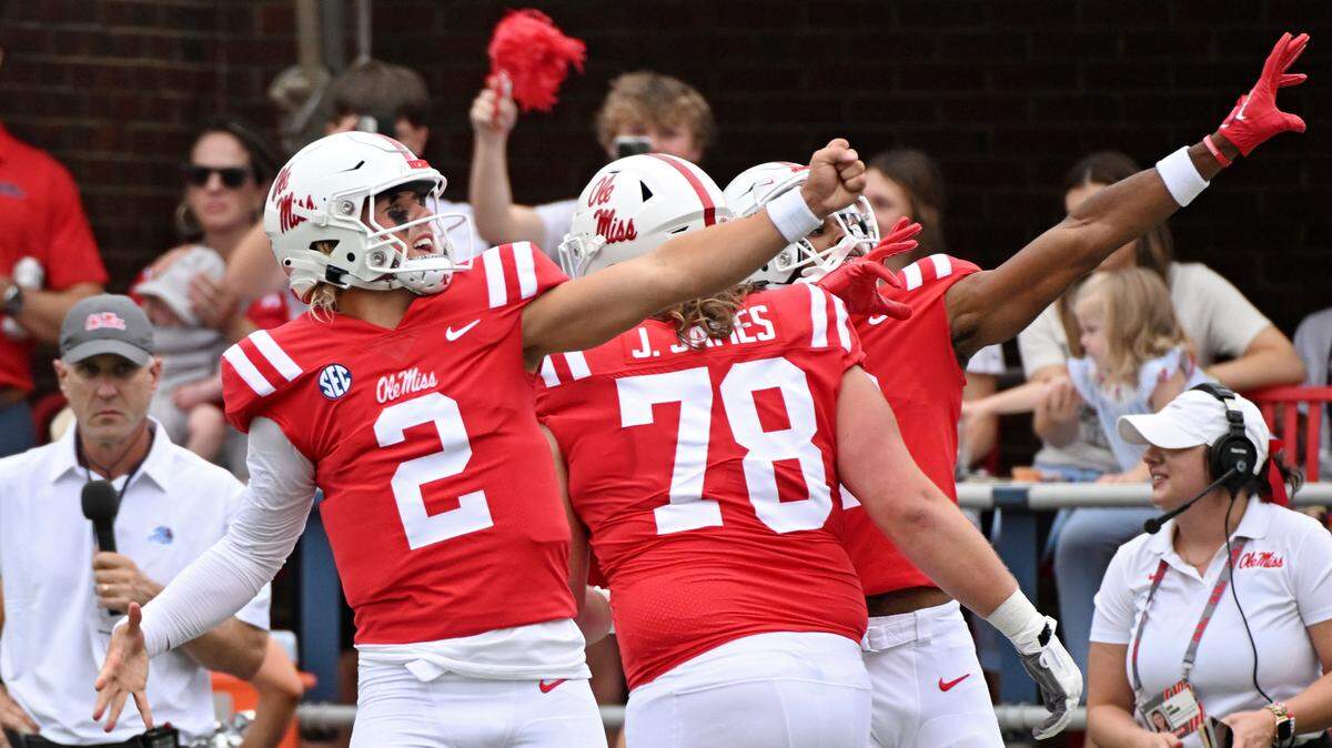 Mississippi quarterback Jaxson Dart (2) reacts after a Mississippi touchdown during the first half of an NCAA college football game against Mercer in Oxford, Miss., Saturday, Sept. 2, 2023. (AP Photo/Thomas Graning)