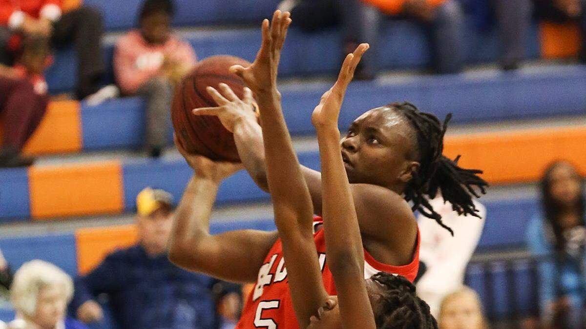 AMANDA McCOY/SUN HERALD 
 Biloxi's Breanna Riley attempts a basket while guarded by Gulfport's Tiara Smith on Friday, February 12, 2016, at Gulfport High.