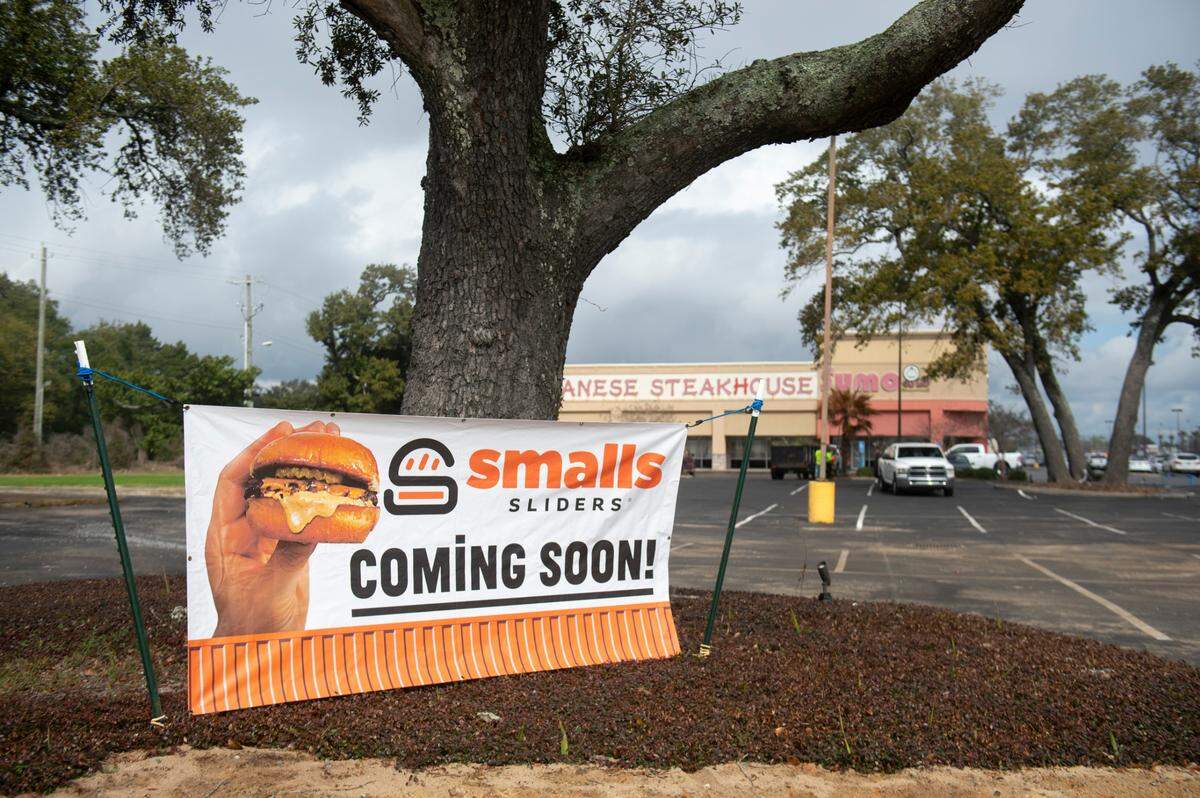 A sign shows where Smalls Sliders is coming at Edgewater Village in Biloxi. It’s on the site of the former Cajun chicken at the beach.