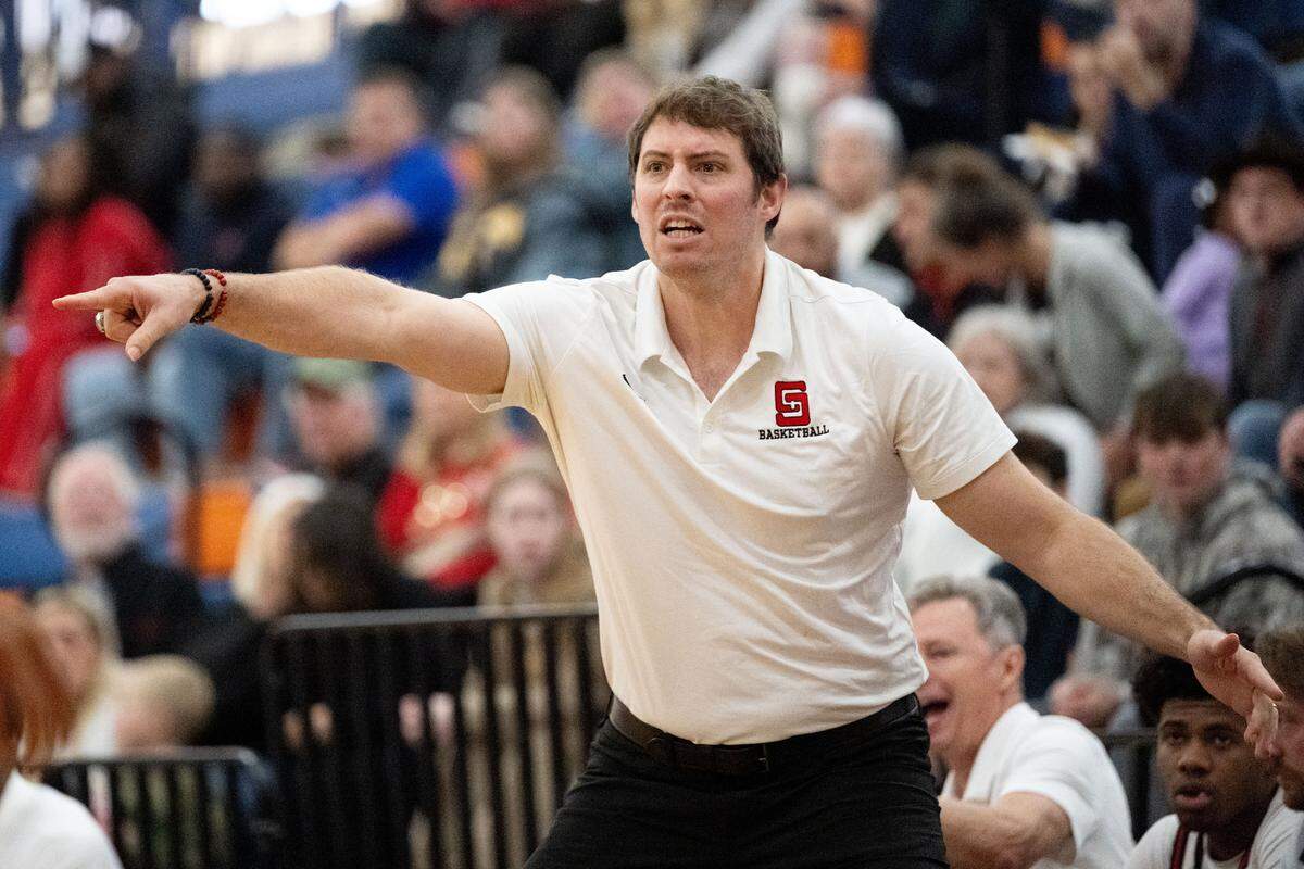 Saint Stanislaus head coach Daniel Grieves directs his players during a boys Gulfport Holiday Classic game at Gulfport High School on Monday, Dec. 29, 2025.