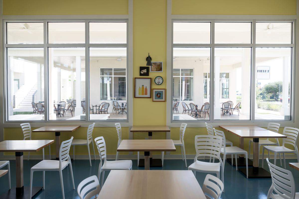A seating and dining area at St. James Cheese Company in Pass Christian 
