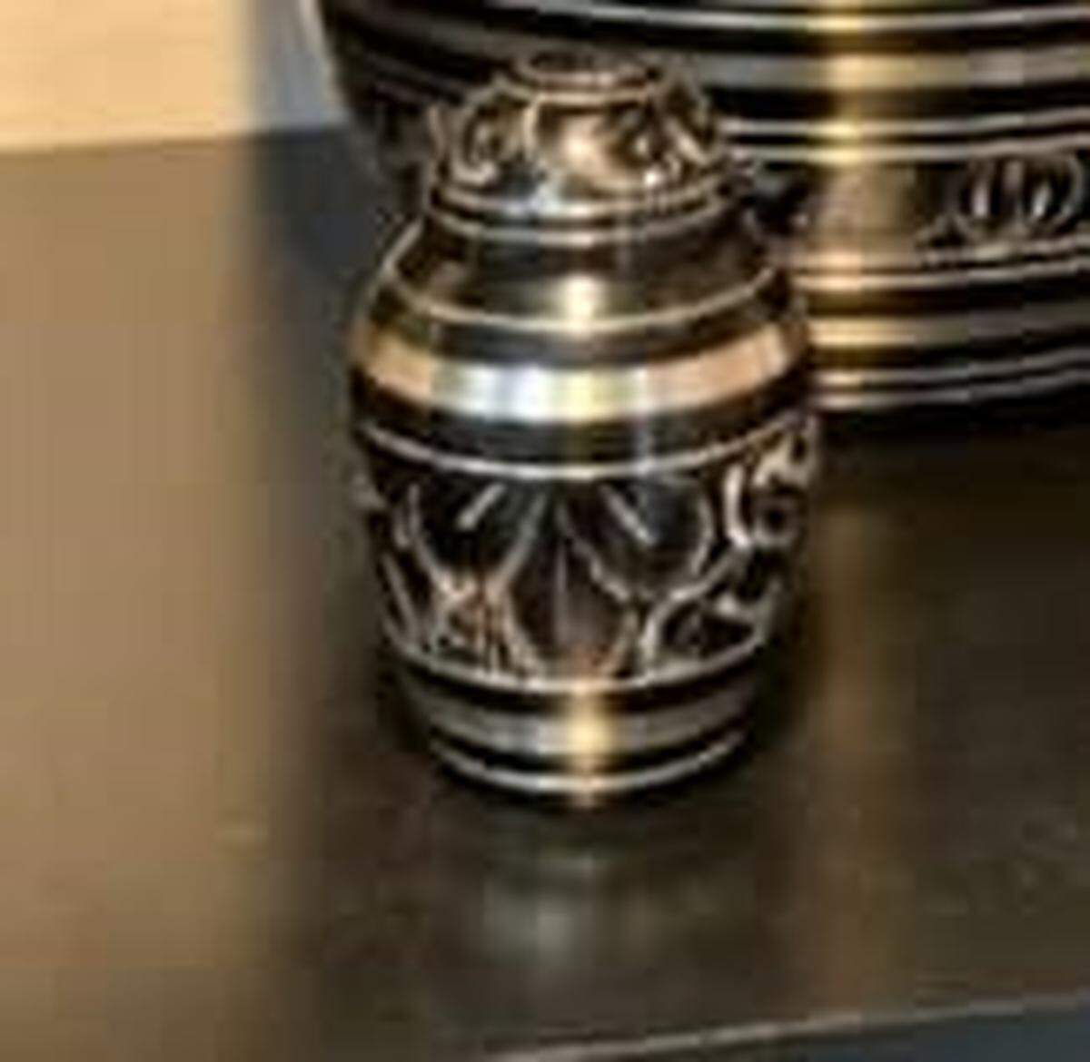 A small urn containing the ashes of a veteran was missing while the bride and groom were inside enjoying a wedding toast.