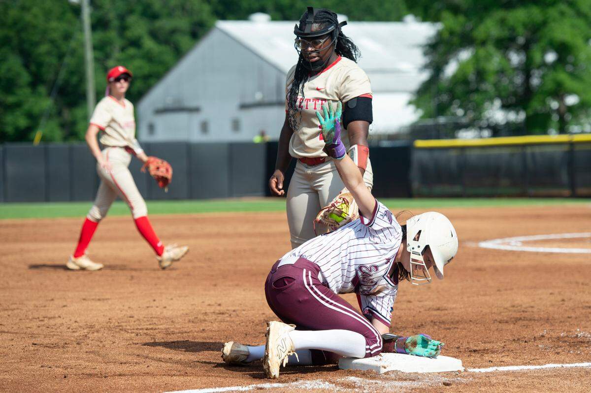 East Central’s Chloe Sheppard slides into third base during the MHSAA 5A Softball Championship at USM Softball Complex in Hattiesburg on Wednesday, May 14, 2025.
