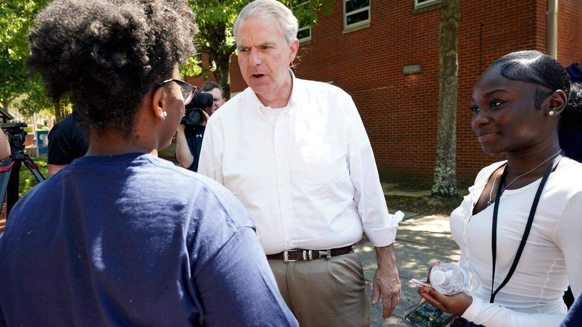 Jackson State University students listen as Democratic candidate for governor Brandon Presley, center, speaks with them during a JSU Votes Civic Engagement Initiative on National Voter Registration Day, Tuesday, Sept. 19, 2023, in Jackson, Miss. Several student groups hosted the voter registration drive and provided a forum for students and candidates to meet prior to upcoming local and state elections. (AP Photo/Rogelio V. Solis)