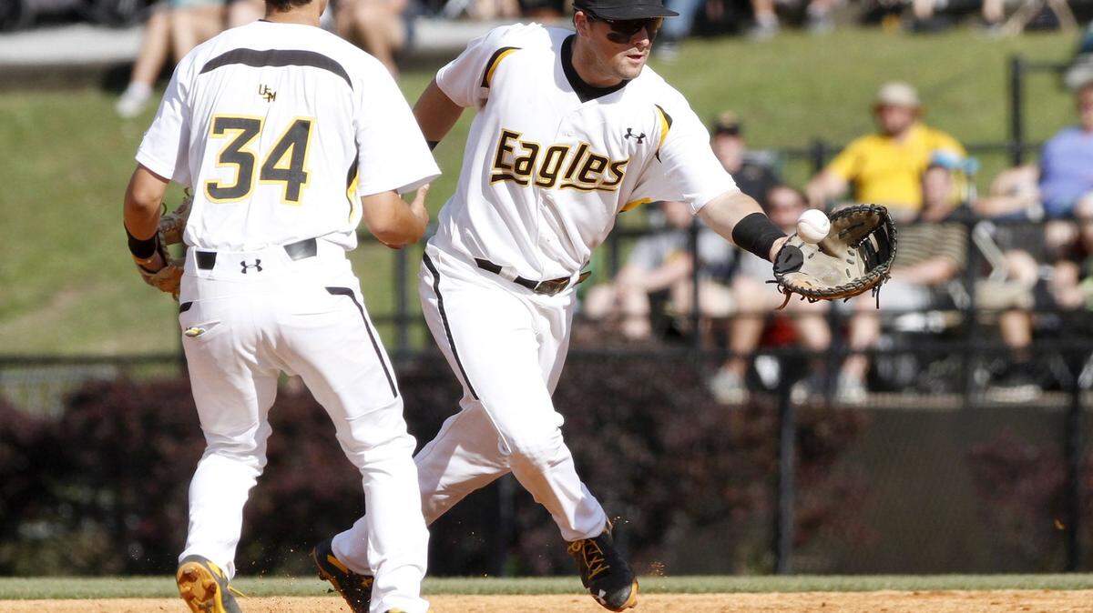 TIM ISBELL/SUN HERALD 
 Southern Miss first baseman Tim Lynch grabs the ball after second baseman Storme Cooper misplayed the pop up, Saturday, Apr. 23, 2016.