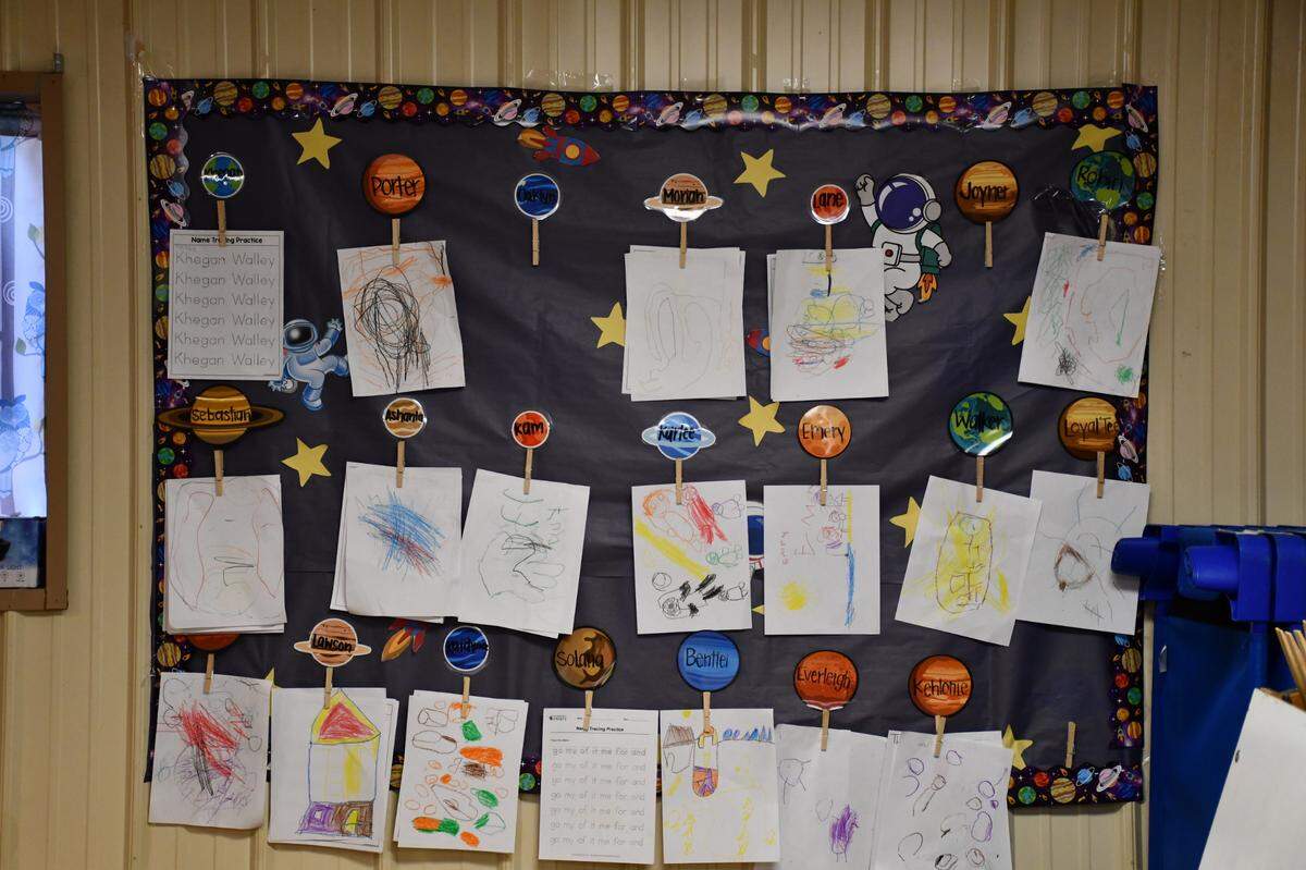 Hand-drawn art and name labels hang in the hallway at Bettie’s ABC. The center emphasizes early learning, creativity and social development for infants to school-aged children.