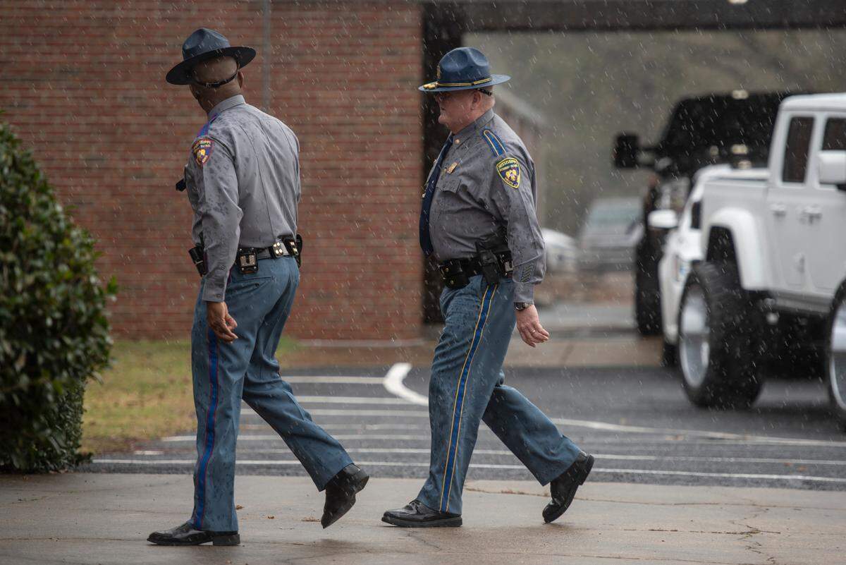 Mississippi Highway Patrol state troopers arrive at Agricola Baptist Church in George County for the funeral of George County Sheriff’s Deputy Jeremy Malone on Friday, Jan. 12, 2024.