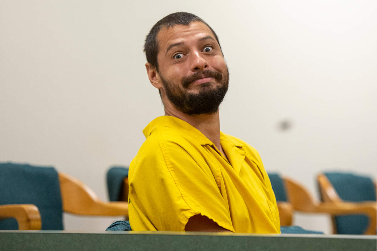 Aaron Blake Haylock, accused of capital murder in the death of his stepfather, Douglas Arguelles, 60, stares at the camera before an initial appearance before Judge Mark Watts in Jackson County Court in Pascagoula on Tuesday, Sept. 5, 2023.