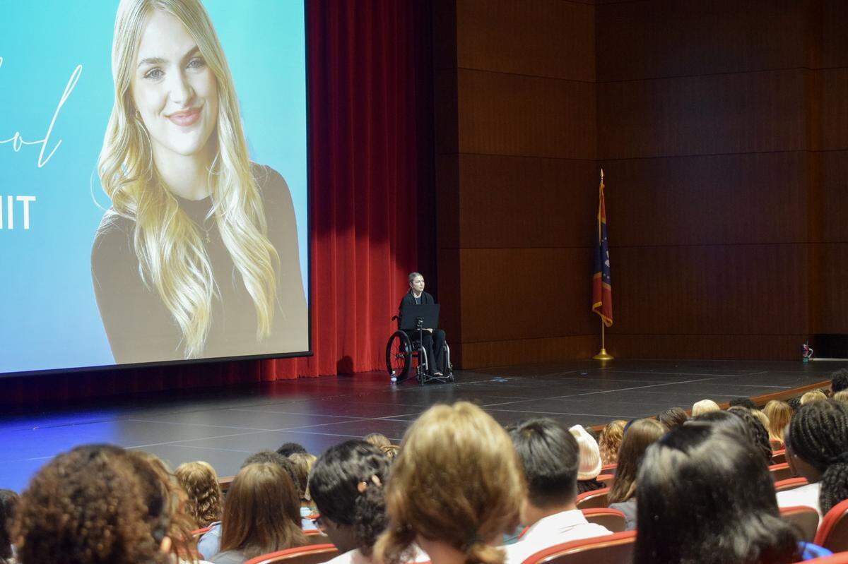Emma Benoit of Louisiana speaks to students at a mental health summit in October hosted by Singing River Health System, with the Jackson County Chamber of Commerce and Pascagoula-Gautier School District. Benoit, who attempted suicide in 2017, encourages young people to seek help rather than struggling silently with depression, anxiety or other mental health issues.