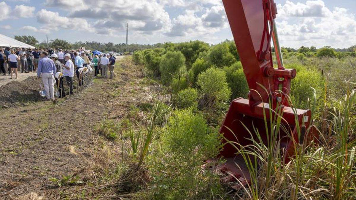 Public officials, staff with the Coastal Protection and Restoration Authority, and rebuilding advocates from across Louisiana gather last year at the area where the Mid-Barataria Diversion will be built. On Wednesday, officials confirmed the state could lose $1 billion if the project is canceled.