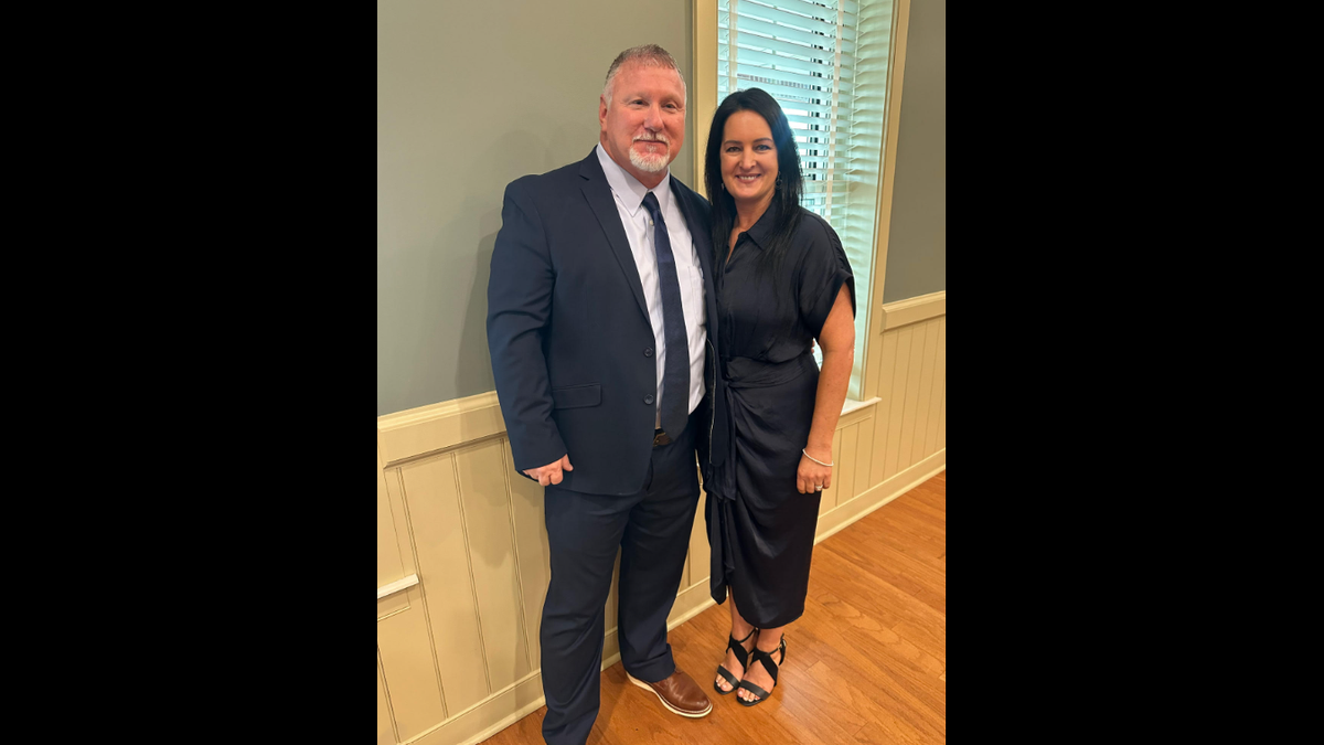 The Hancock County Board of Supervisors appointed Hancock County Patrol Commander Johnny Alison to serve as interim sheriff. Alison is pictured here with his wife, Maryjo Alison.