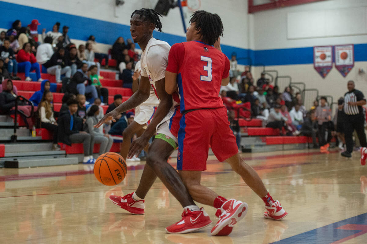 Pascagoula’s Dorrian McMillian tries to protect the ball during a game against Pass Christian at Pascagoula High School on Tuesday, Dec. 20, 2022.