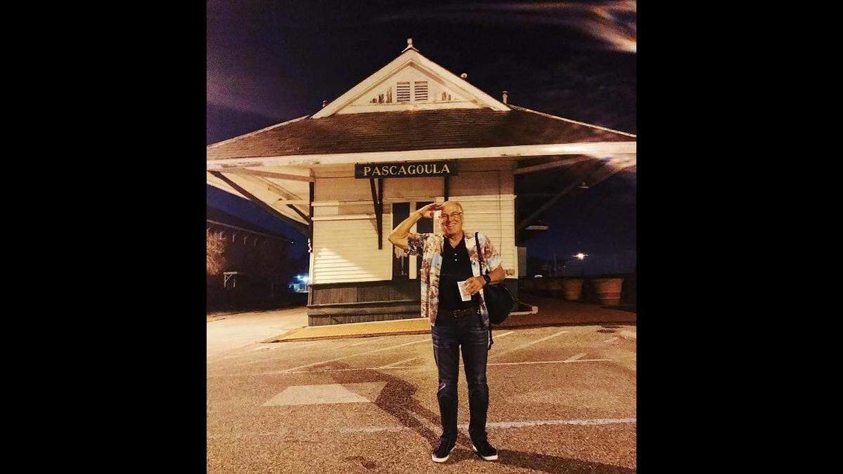 Jimmy Buffett salutes outside the historic 1904 Pascagoula train depot, which will open soon as the Chandeleur Depot Brewpub. The late singer-songwriter was born in Pascagoula and has a bridge dedicated in his honor. This photo and a parrot guitar will hang inside the restaurant dining room in tribute to the native son.