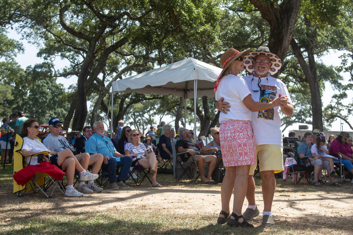Charlotte Chance and David Foster, of Heber Springs, Arkansas dance to live music at Centennial Plaza during Cruisin’ the Coast on Tuesday, Oct. 3, 2023.