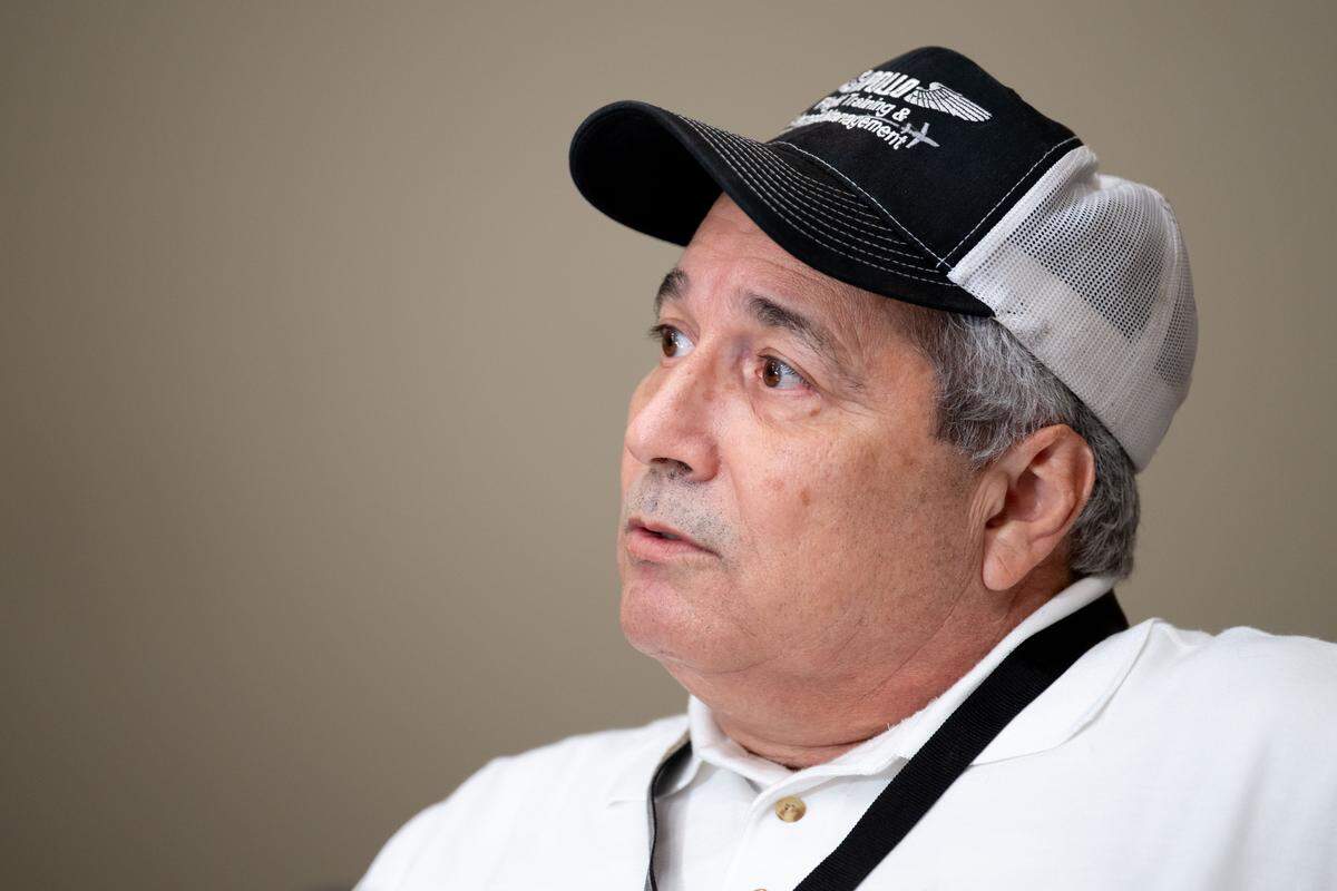 Michael Carastro speaks Tuesday during a press conference at Million Air hangar in Gulfport.