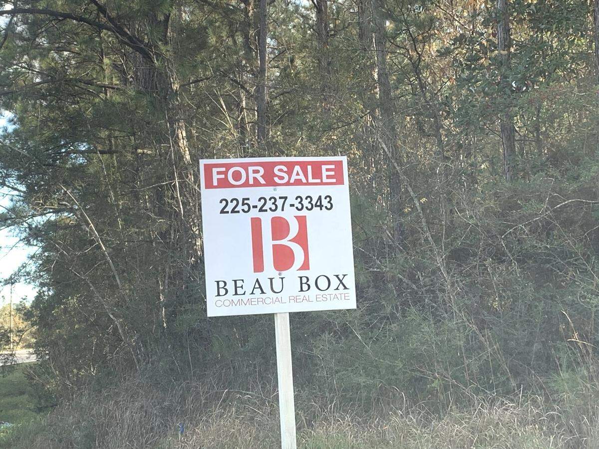 Signs are posted along Firetower Road in Harrison County, where more than 100 acres are for sale just north of the new Buc’ee’s travel center. The owners of the property are from Georgia.