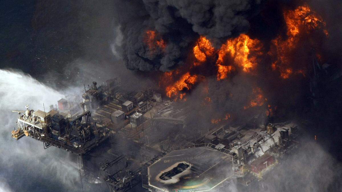The Deepwater Horizon oil rig burns south of the Mississippi Coast in 2010.