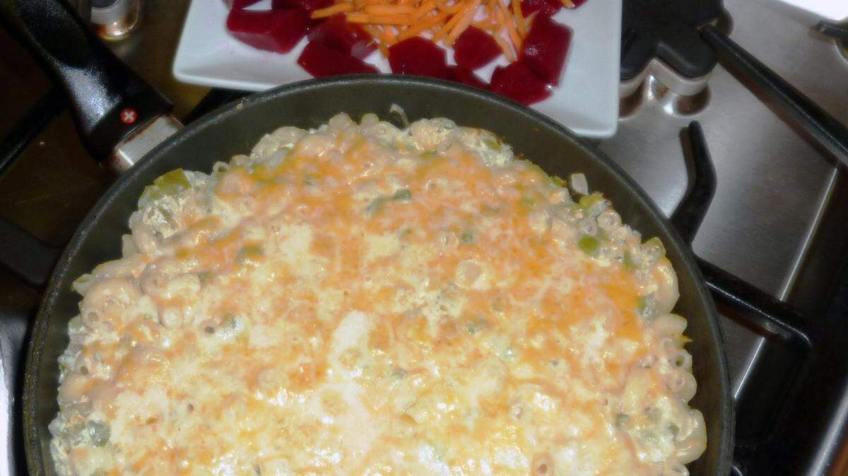 LINDA GASSENHEIMER/TNSBajan macaroni pie is served with island beet and carrot salad.