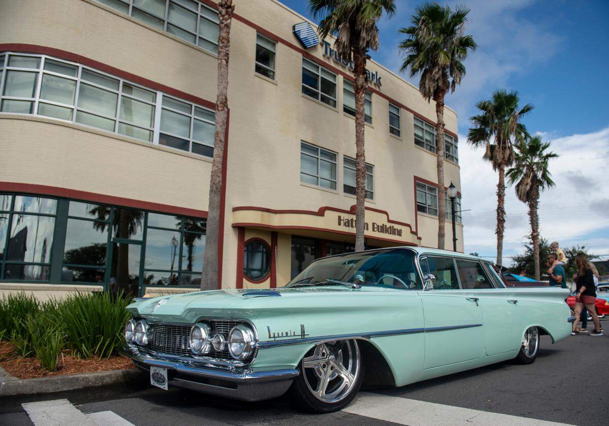 A classic car parked in front of the Hatten Building in downtown Gulfport during View the Cruise on Sunday, Oct. 3, 2021.
