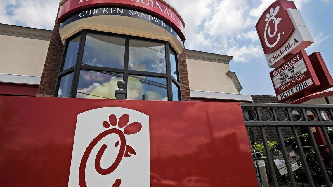 Both directors worked at a Chick-fil-A in Alabama and one used the fraud as a chance to secure a mortgage, court records say. (AP Photo/Mike Stewart, File)