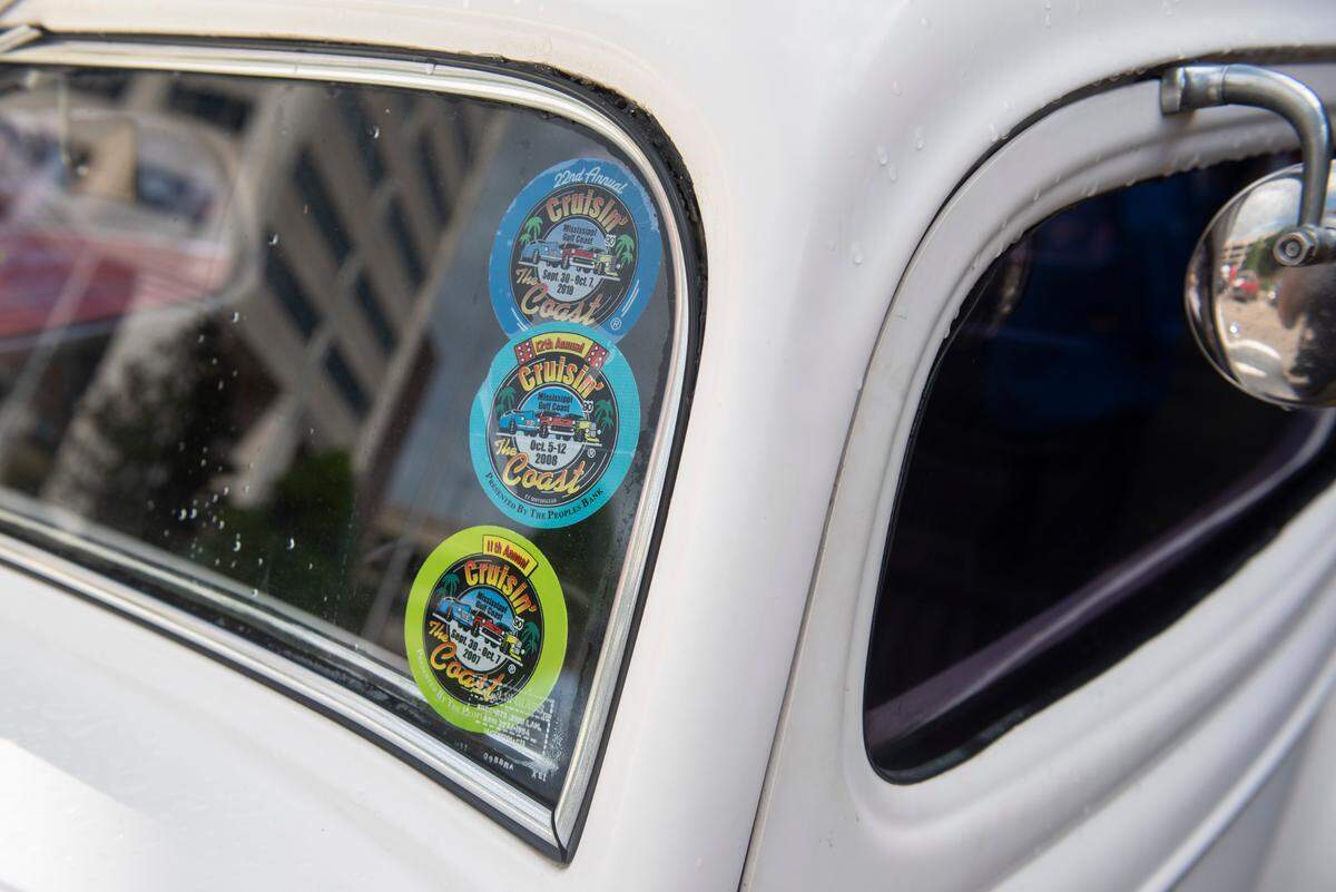 Stickers from past years of Cruisin’ the Coast on a car during View the Cruise on Sunday, Oct. 3, 2021.